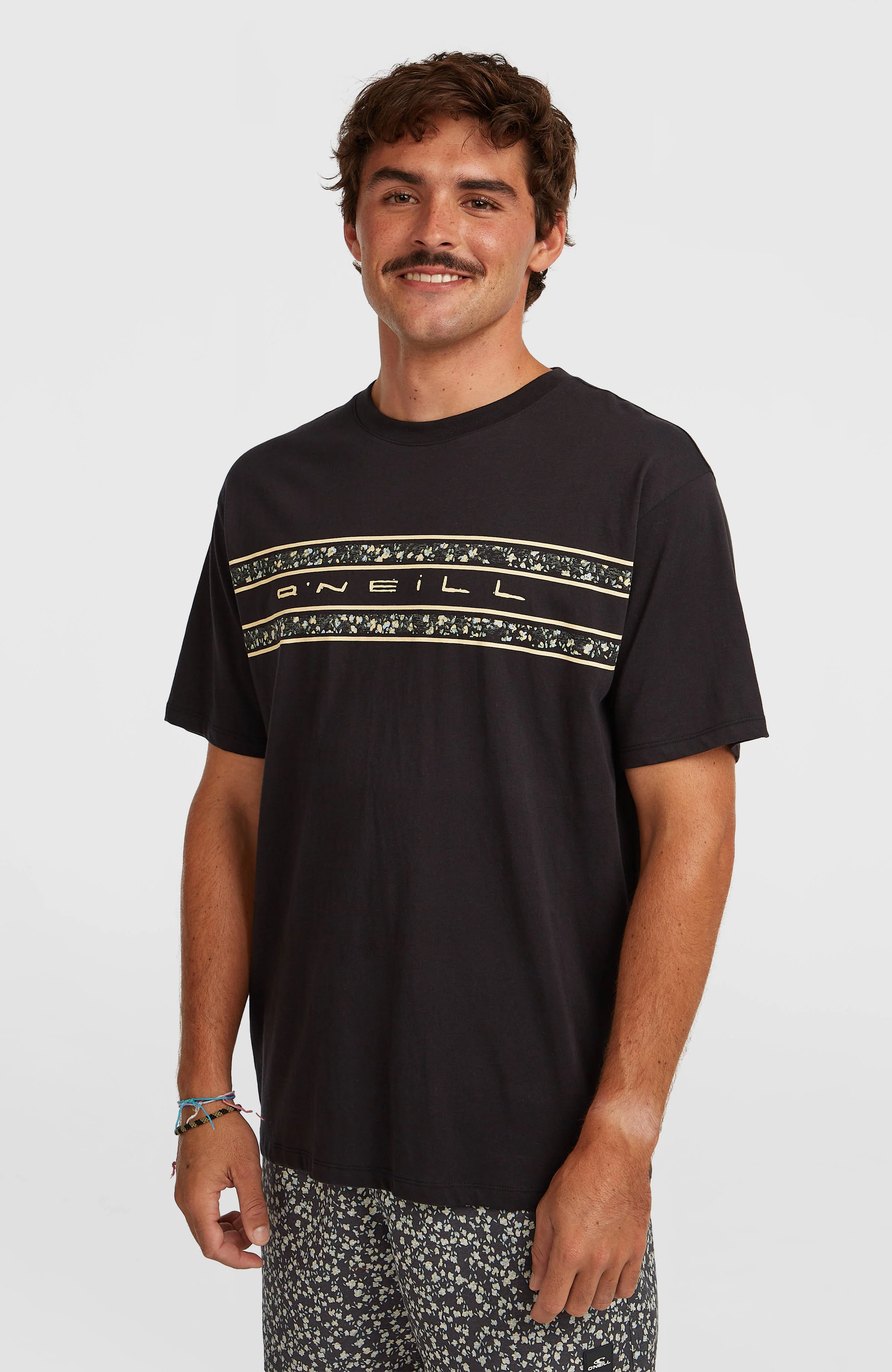 5999-o-neill-flower-stripe-t-shirt-black-out-1.webp O’Neill Flower Stripe T-Shirt | Black Out